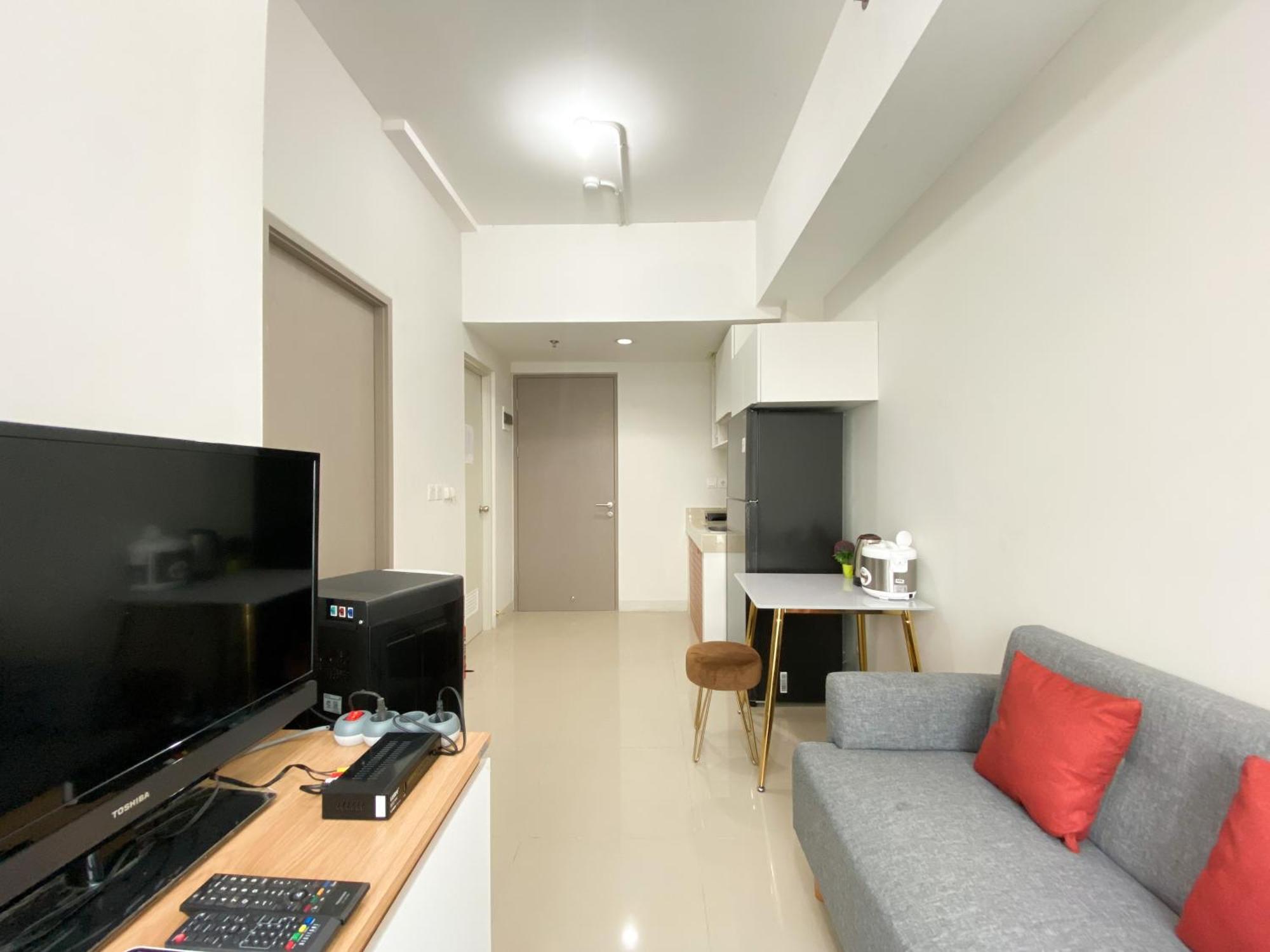 Cozy 1br At Vasanta Innopark By Travelio Apartemen Cikarang